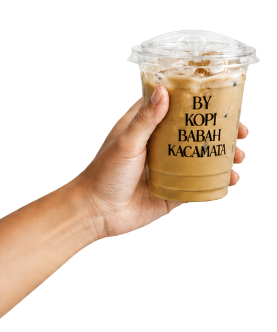 Hand holding a Kopi Babah Kacamata iced coffee cup