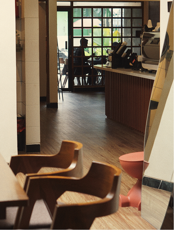 Wooden counter and coffee bar inside COCA Salatiga