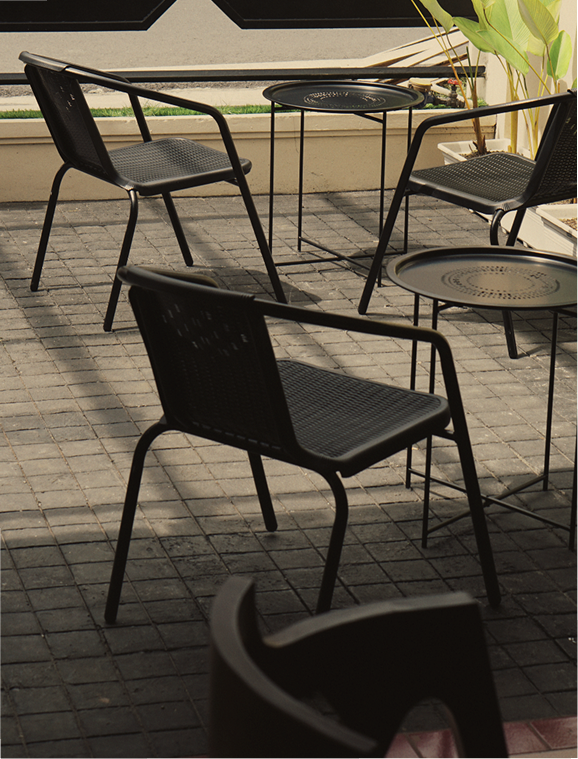 Outdoor terrace seating at COCA coffee shop